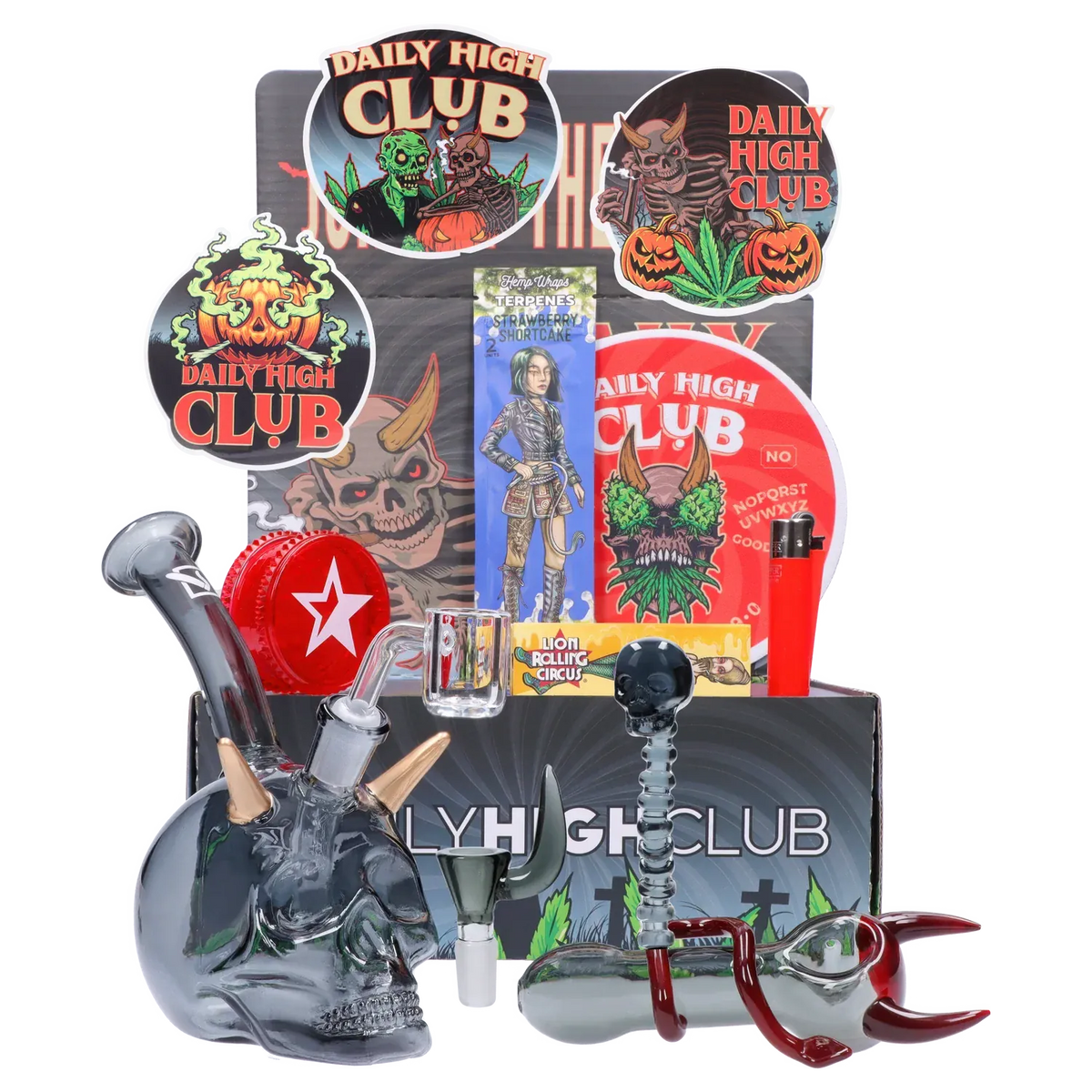 Front-facing arrangement of the “Dank & Dead” Smoking Box showing skull-themed glassware, stickers, and colorful packaging.